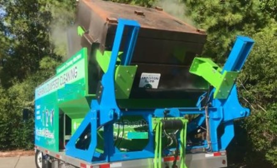 Deodorizing treatment being applied to a commercial container